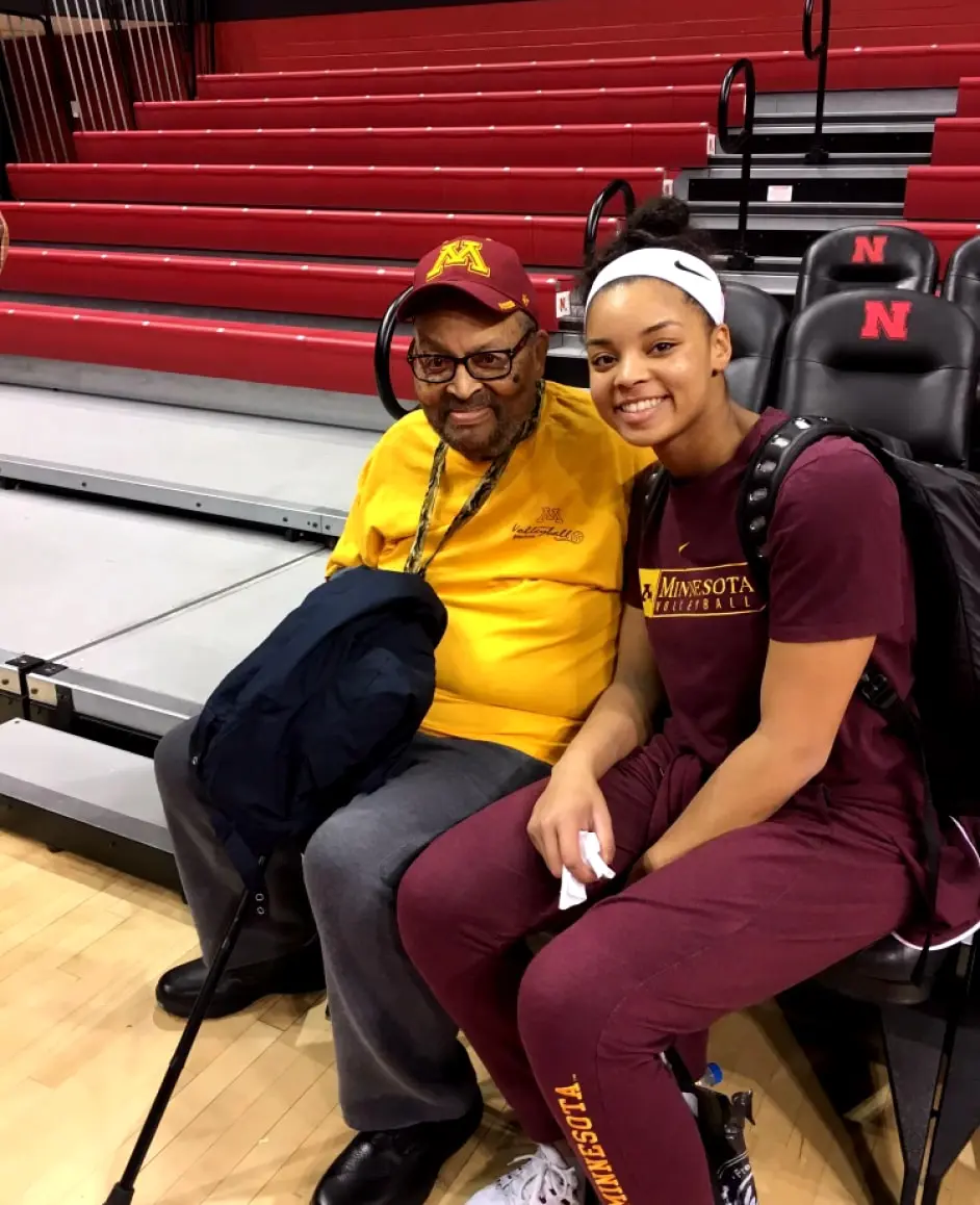 Alexis Hart sharing a courtside family moment